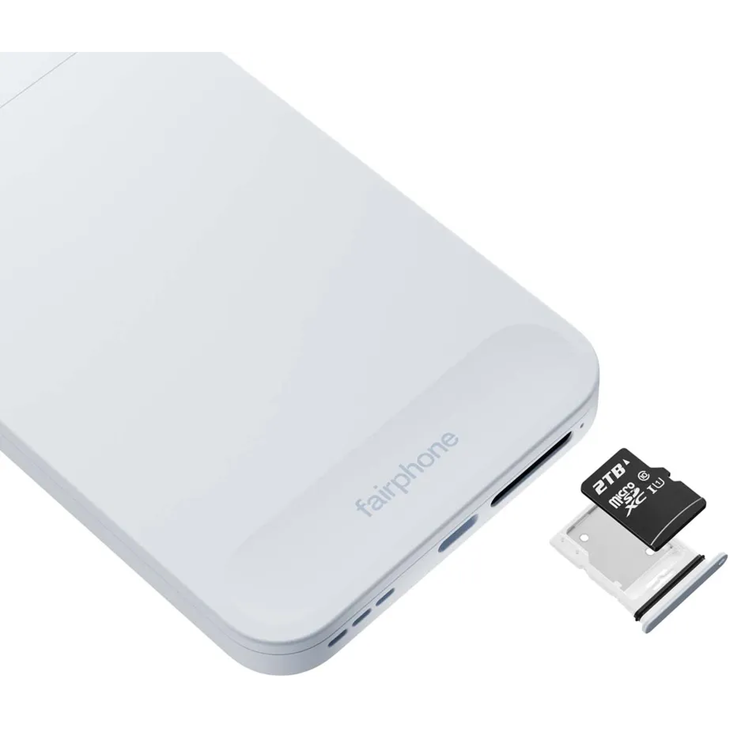 Een witte Fairphone met een uitgeworpen simkaartlade en een micro SD-kaart.
